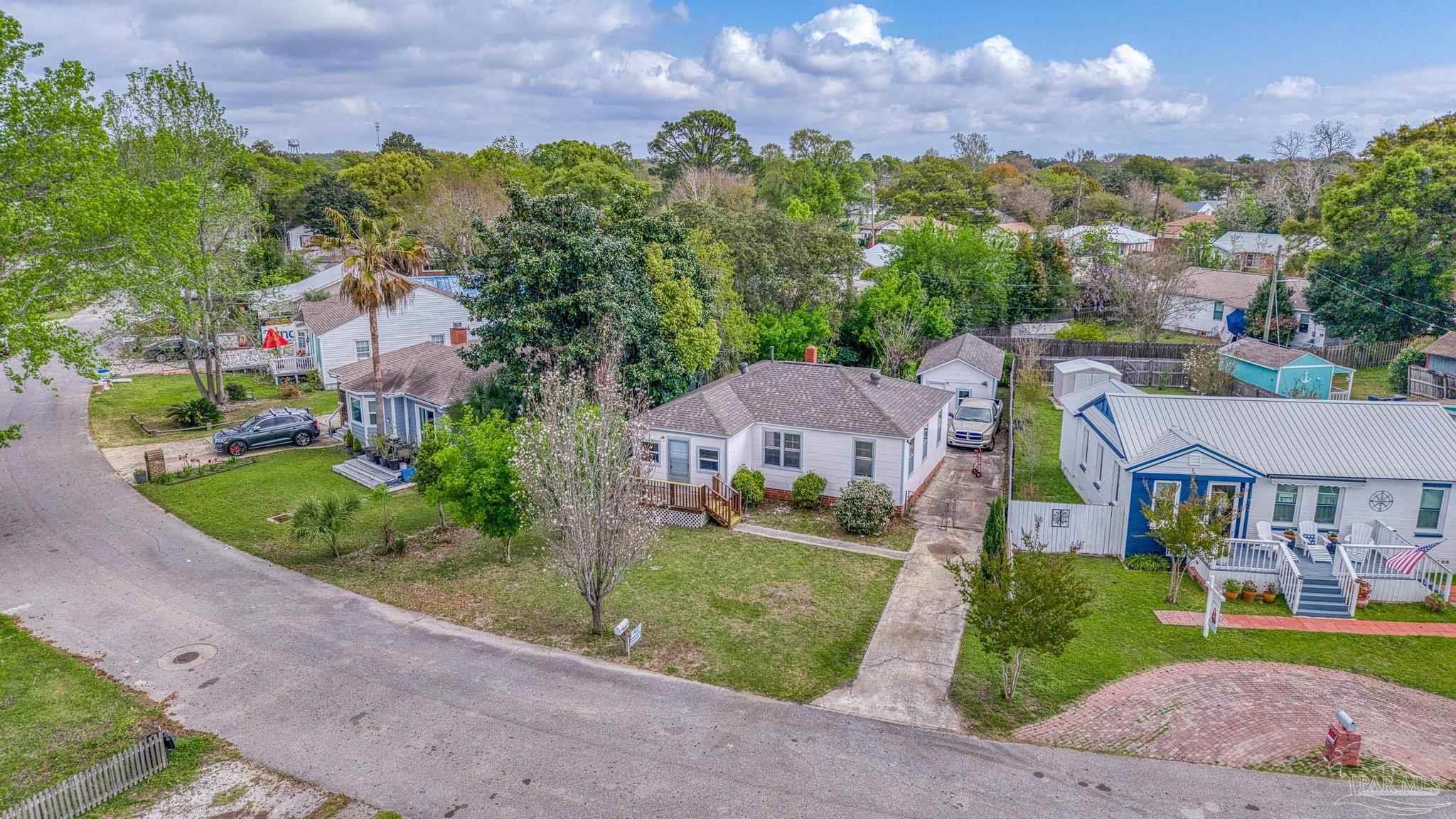 208 Berry Road Pensacola, FL 32507 - Photo 36 of 41 a view of a street with a building in the background