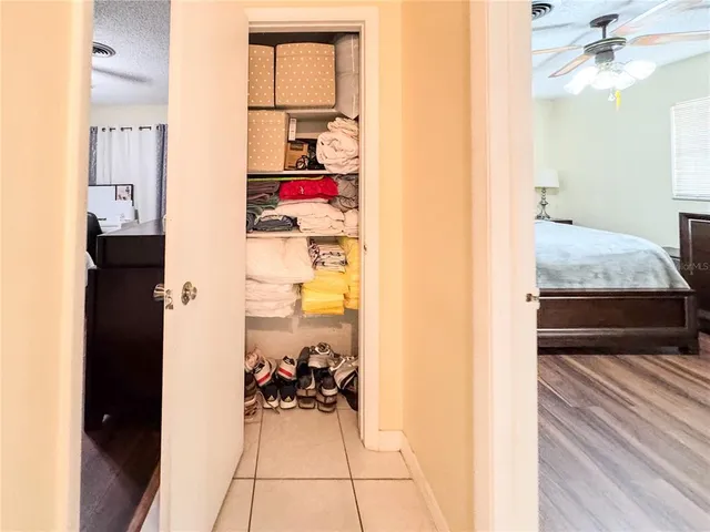 a bed room with a bed furniture and a television