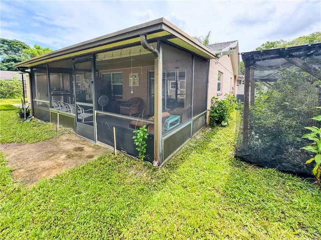 a view of a backyard with garden
