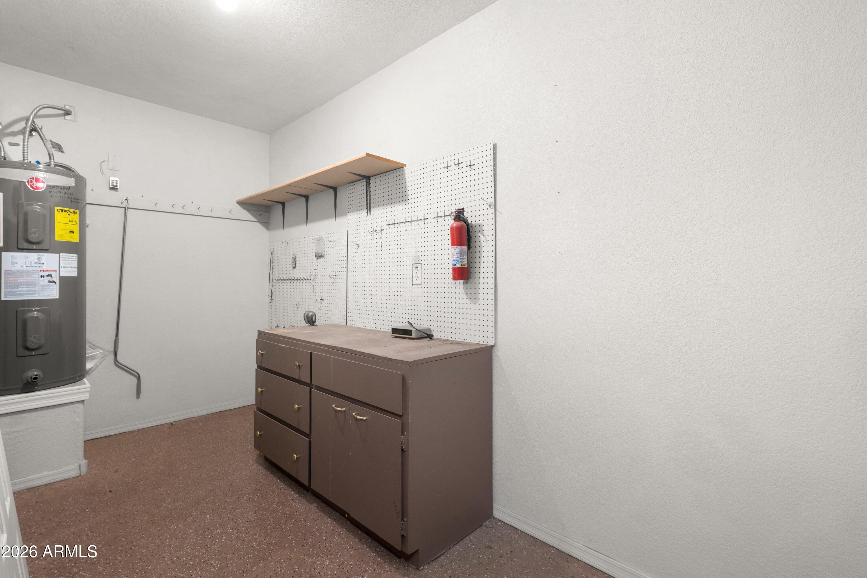 2101 South Meridian Road, Unit 387 Apache Junction, AZ 85120 - Photo 27 of 36 Extra garage space-work bench