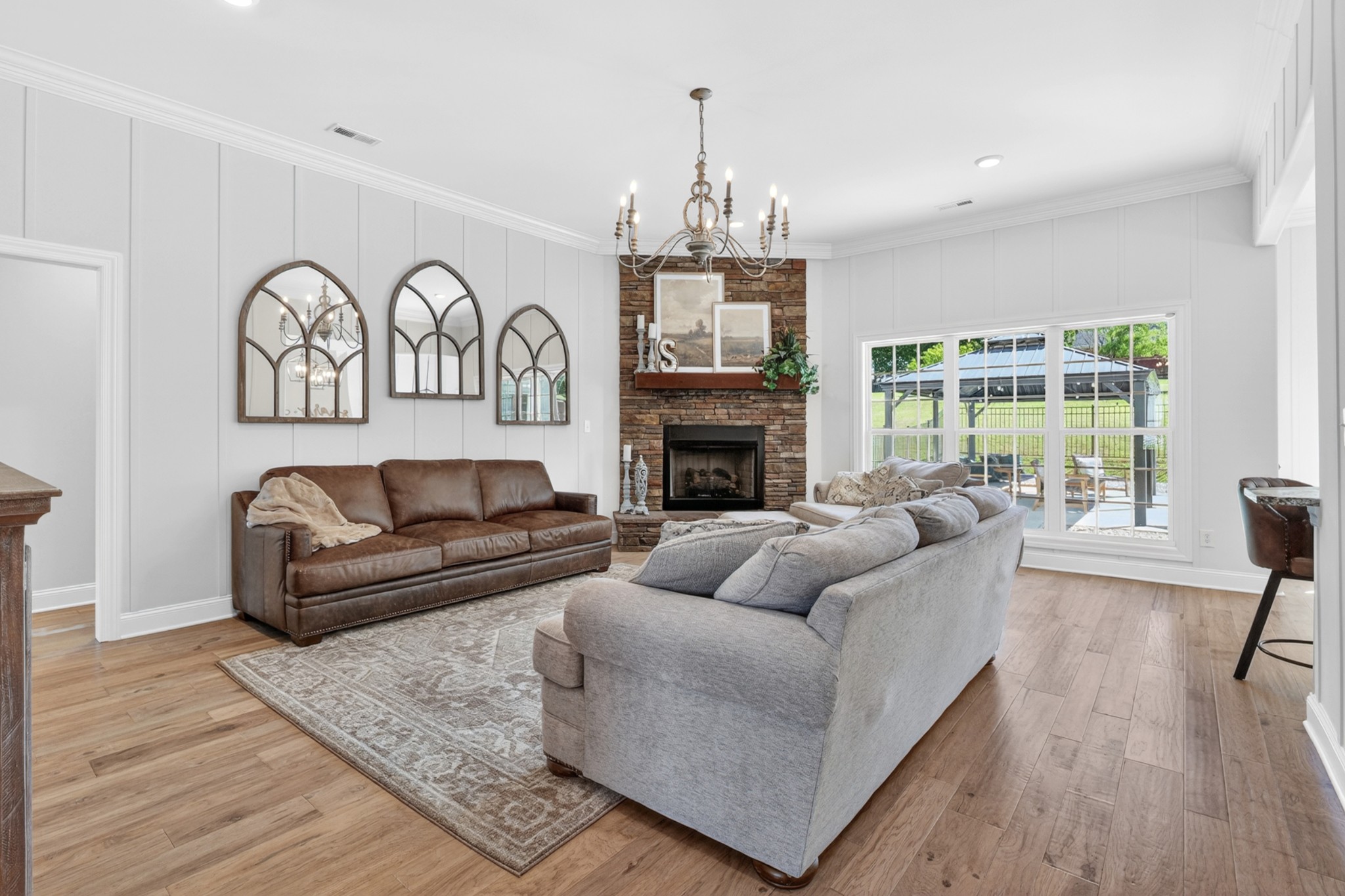 41 Knotting Hill Road Fayetteville, TN 37334 - Photo 12 of 65 a living room with furniture a fireplace and a chandelier