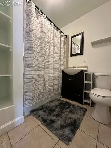 a kitchen with stainless steel appliances a sink dishwasher stove and cabinets