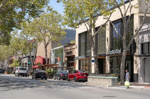 a car parked in front of a building