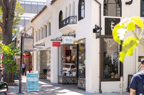 a view of street with sitting area