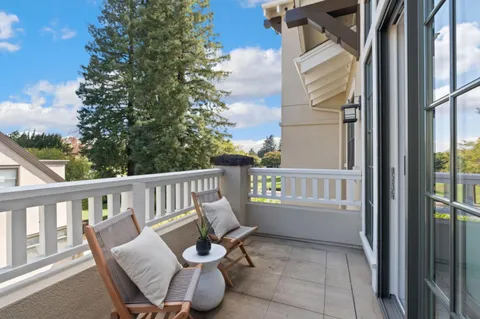 a view of a chair in a balcony