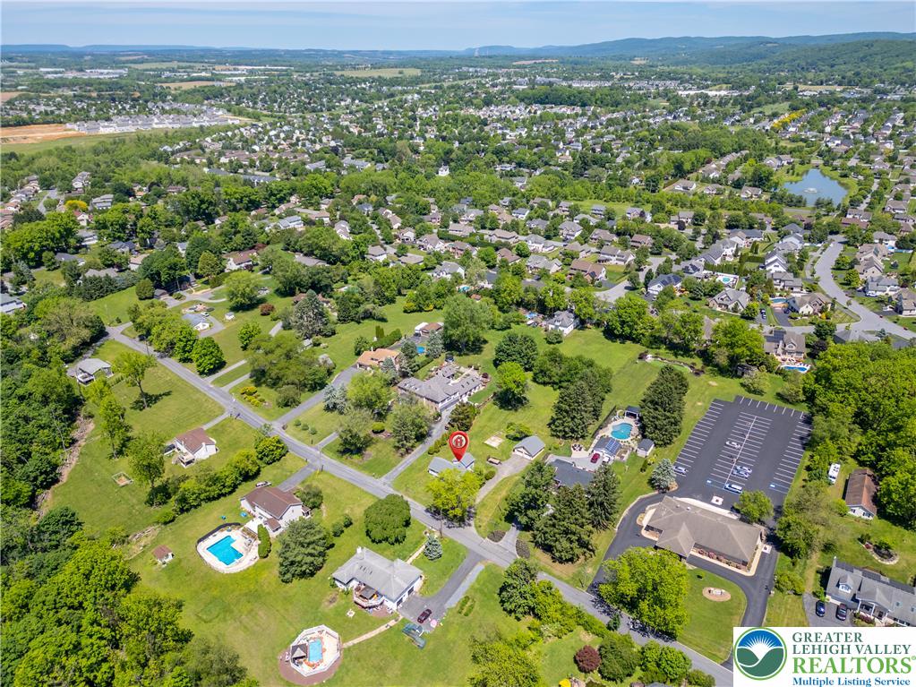 1411 Lieb Road Easton, PA 18040 - Photo 44 of 46 An aerial perspective reveals a vibrant neighborhood with diverse homes nestled among mature trees and lush green spaces.