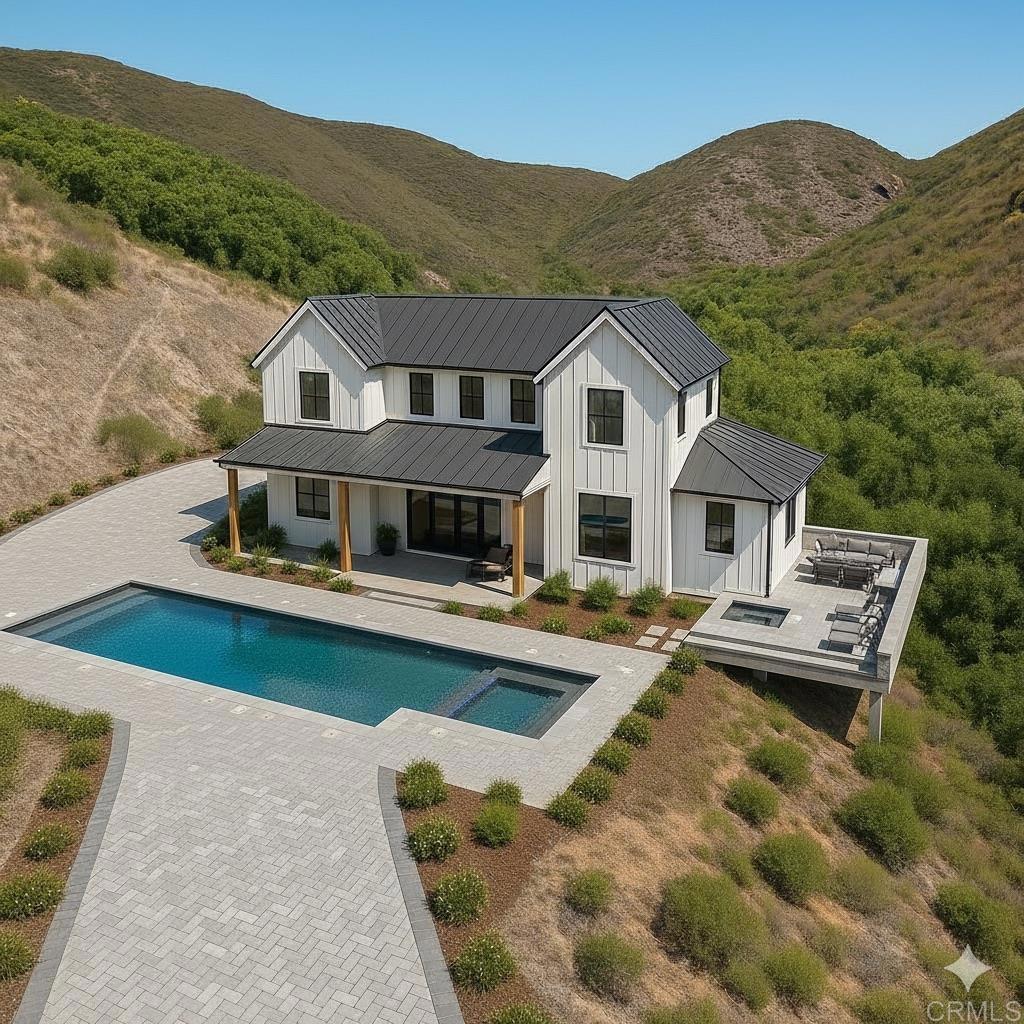 El Calamar Temecula, CA 92590 - Photo 1 of 10 a aerial view of a house with swimming pool table and chairs