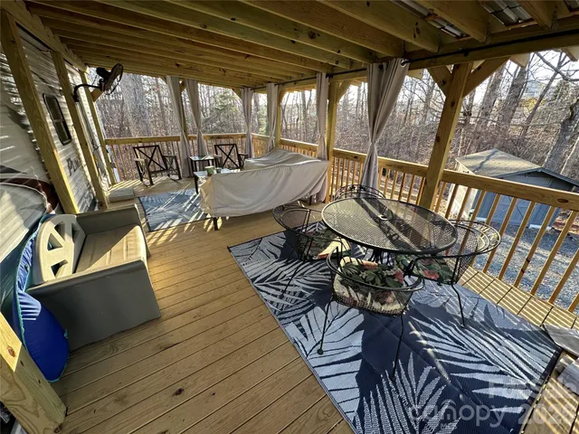 a view of a chairs and table in the patio