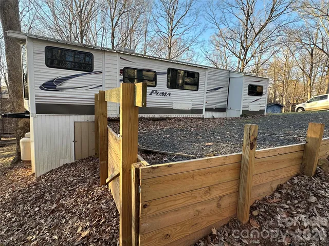 a view of a house with a back yard
