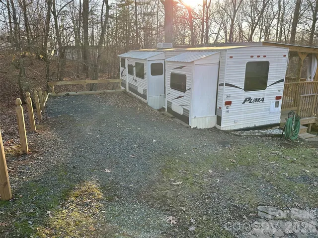 a front view of house with deck