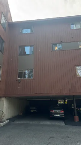 a car parked in front of a building