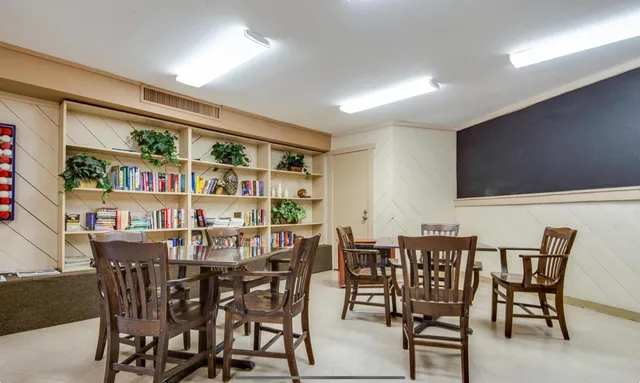 a view of a dining room with furniture