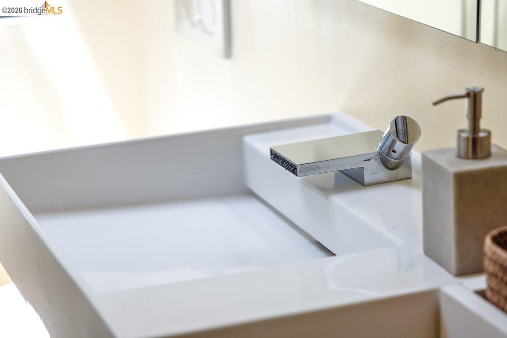 287 Purdue Avenue Kensington, CA 94708 - Photo 48 of 60 White rectangular vessel sink with an integrated chrome faucet