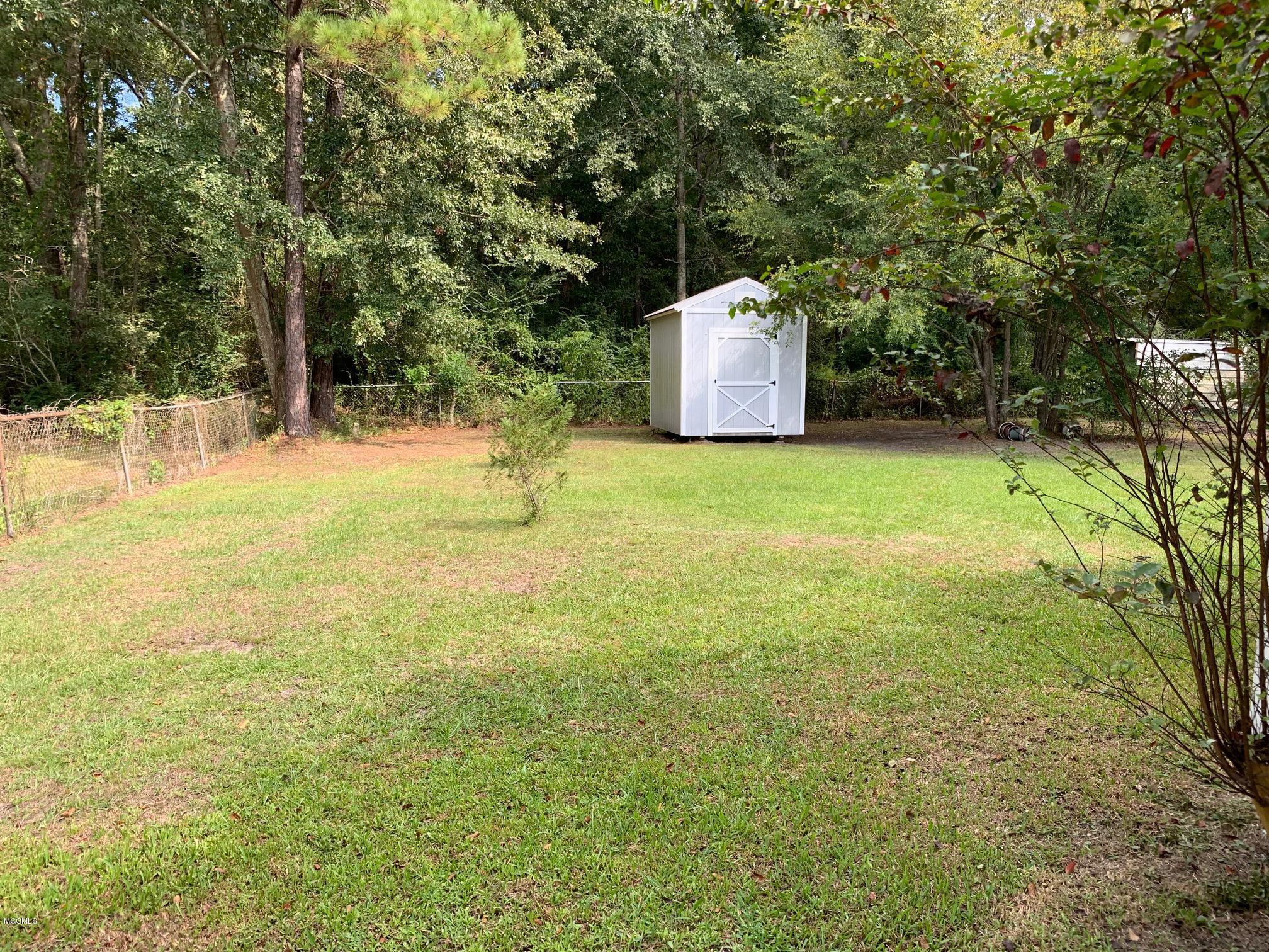 4607 Dutch Bayou Road Moss Point, MS 39563 - Photo 2 of 6 Back yard/shed