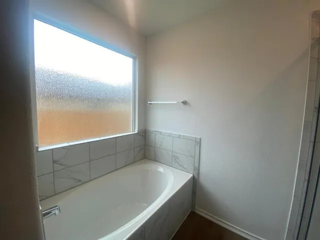a bathroom with a bathtub