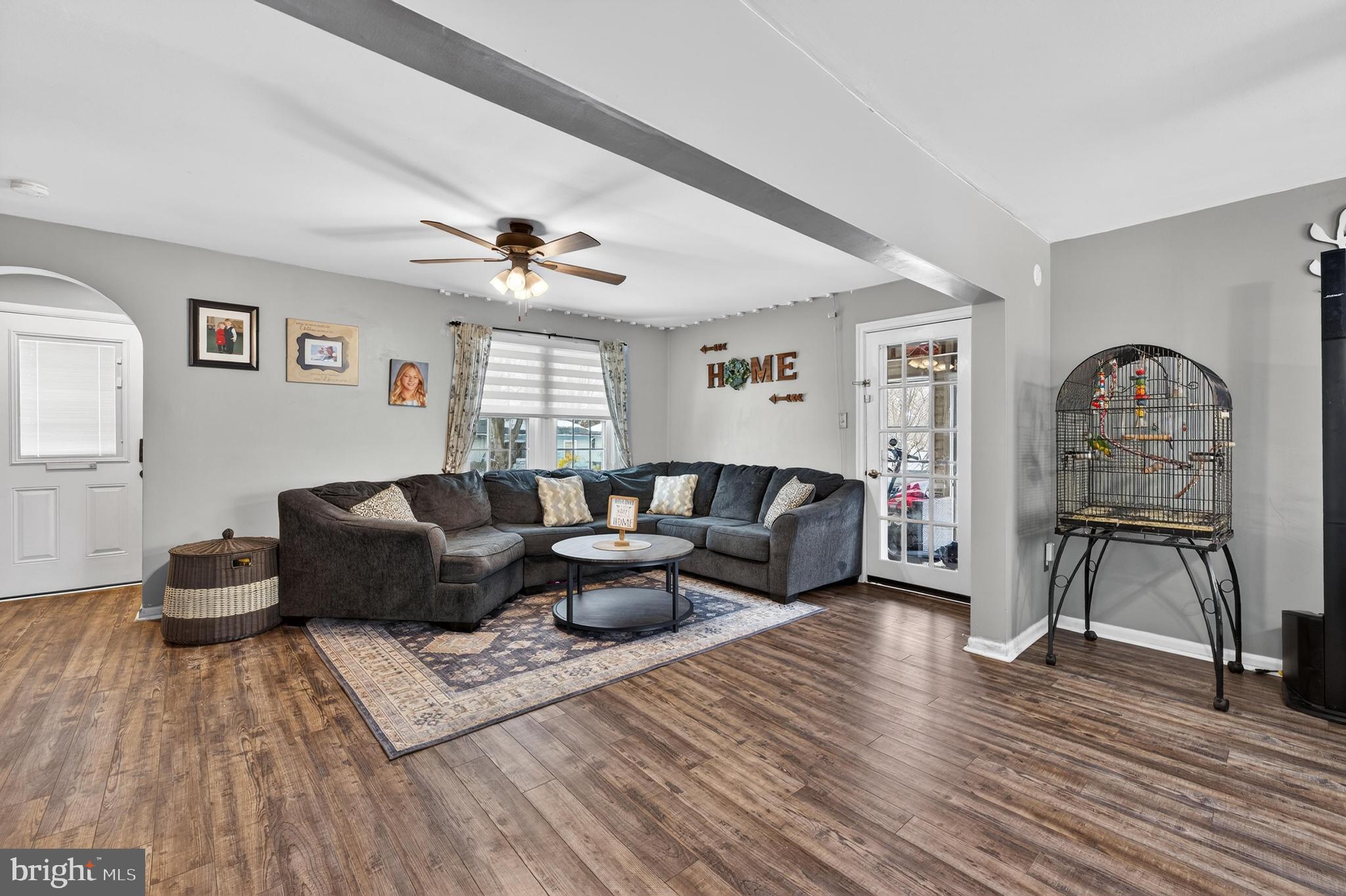 115 South Walnut Avenue Maple Shade, NJ 08052 - Photo 4 of 30 a living room with furniture a fireplace and wooden floor