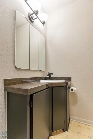 a view of a livingroom with furniture and windows