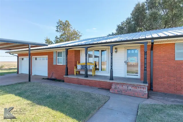 a view of a house with garden