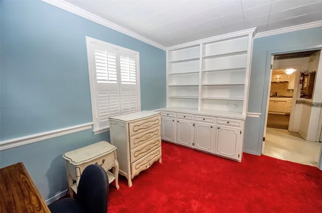 a room with furniture and a flat screen tv