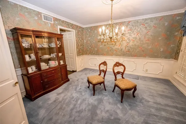 a living room with furniture and a gate