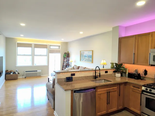 a kitchen with sink and window