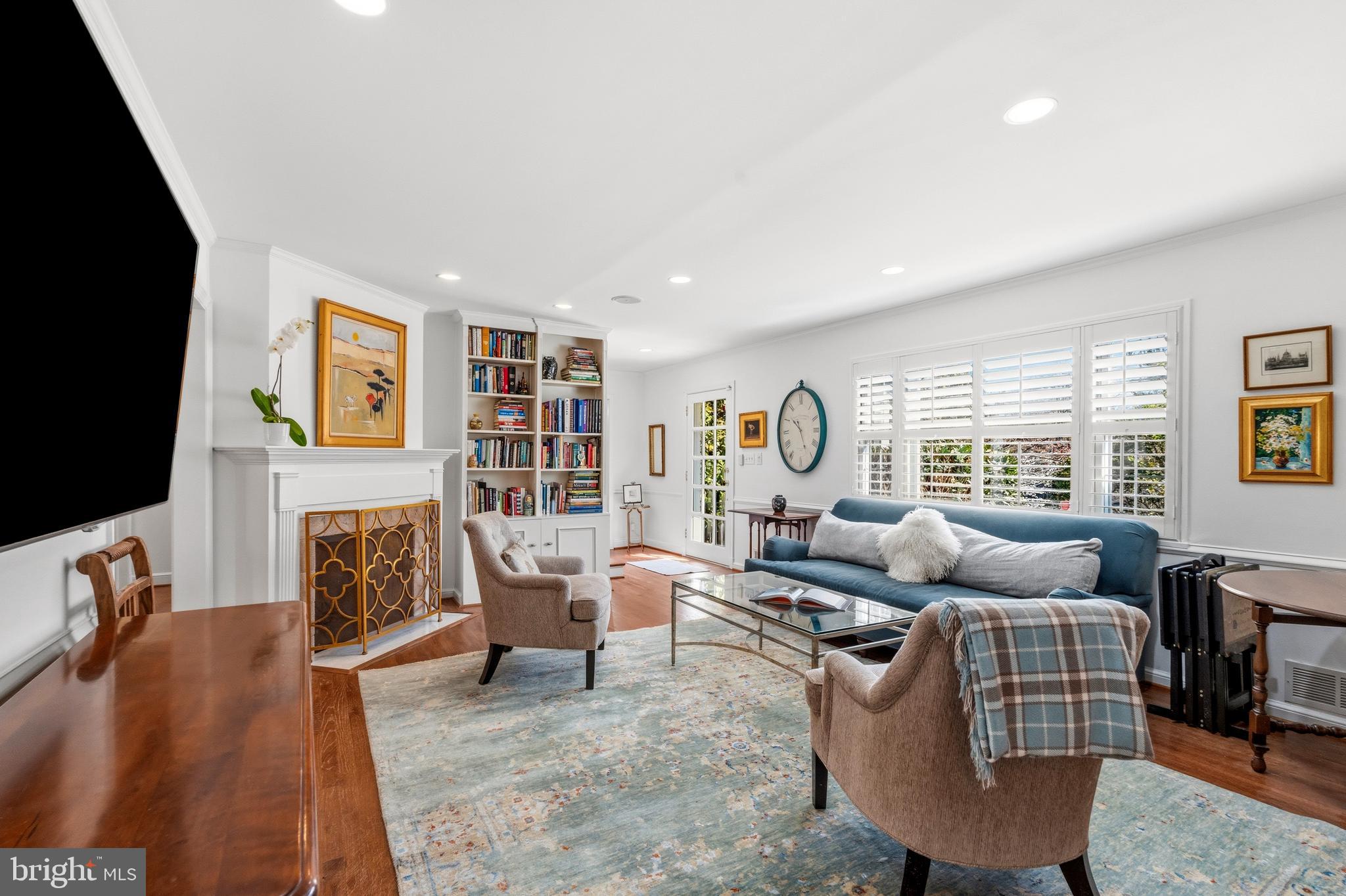 402 Skyhill Road Alexandria, VA 22314 - Photo 4 of 42 Fireplace creates a cozy ambiance