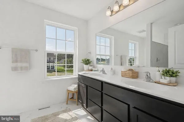 a room with a sink and a window