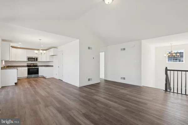 a view of kitchen with wooden floor