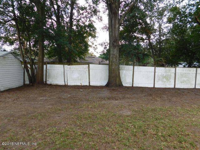 9770 Lily Road Jacksonville, FL 32246 - Photo 15 of 53 a view of a backyard