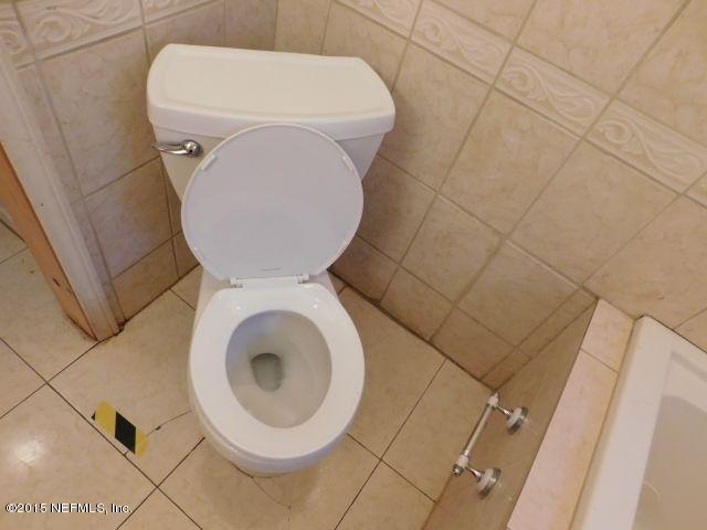 9770 Lily Road Jacksonville, FL 32246 - Photo 44 of 53 a close view of a toilet in a bathroom