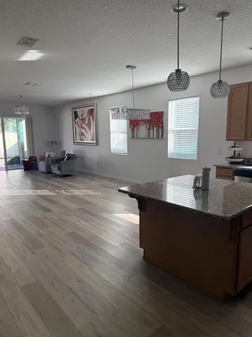 a bedroom with a bed and cabinets