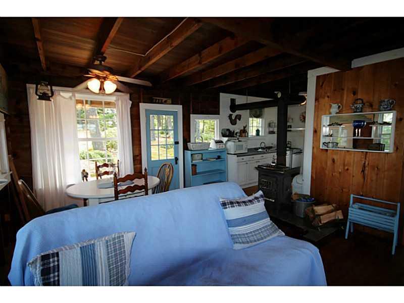 215 Dogfish Head Road Southport, ME 04576 - Photo 18 of 25 Living Room. Cottage Living Room