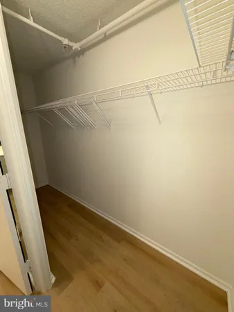 a view of a room with racks on the wall