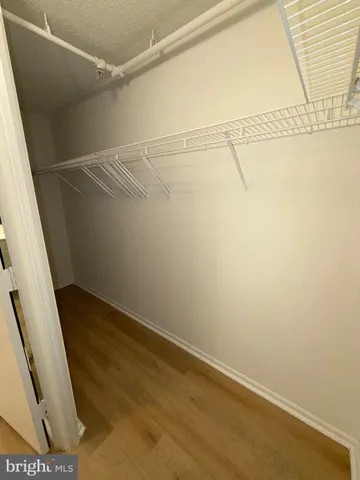 a view of a room with racks on the wall