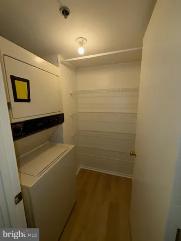 a bathroom with a shower and toilet