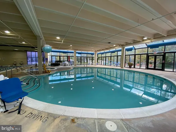 a view of a street with a building in the background