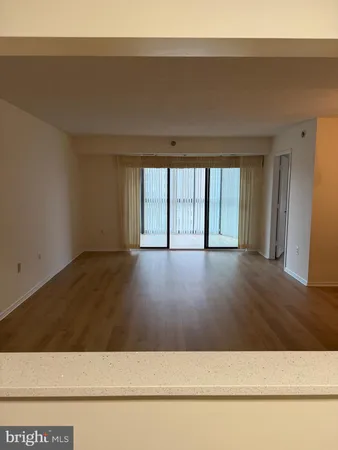 a view of a big room with wooden floor