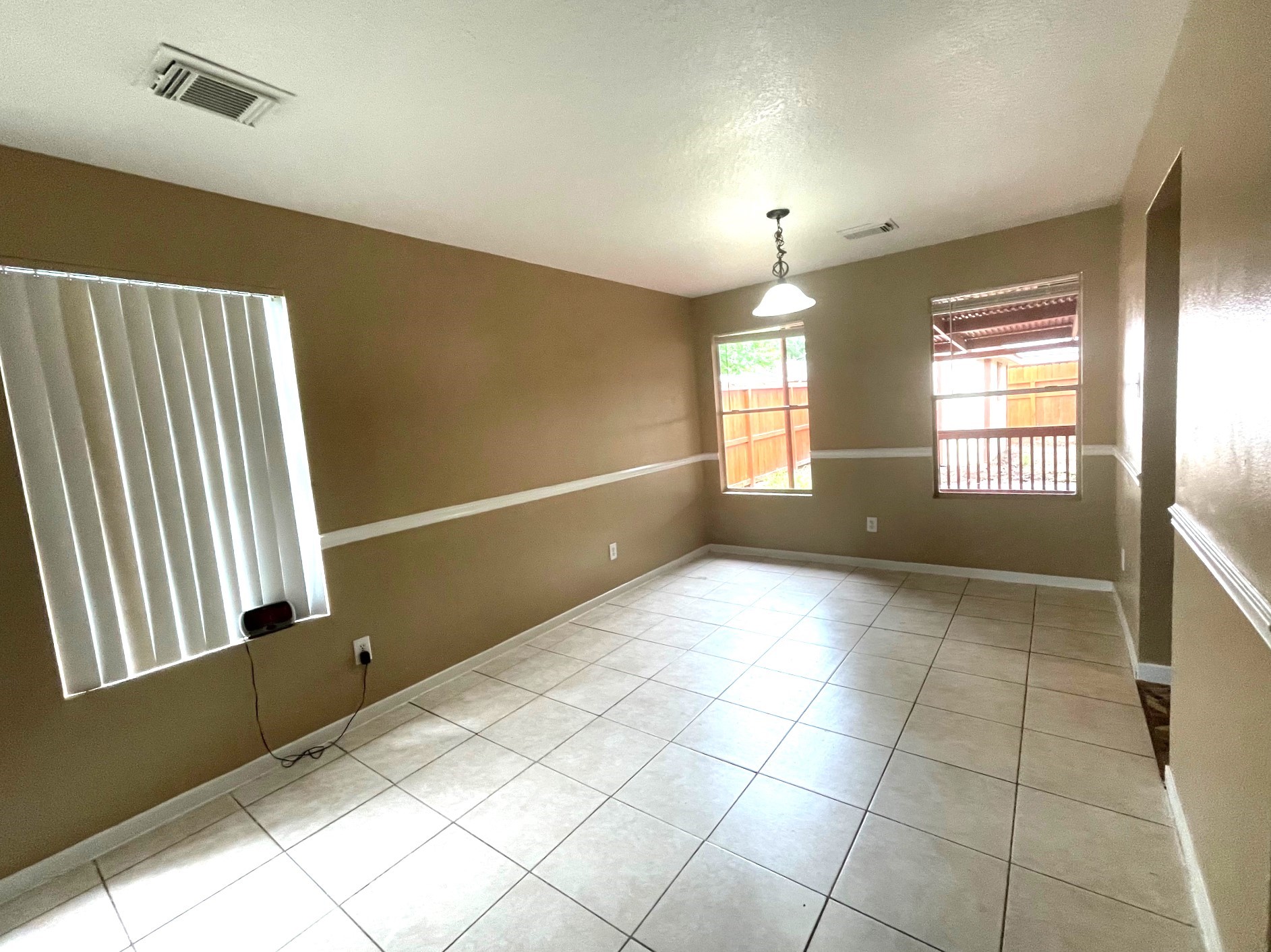 1134 Somercotes Lane Channelview, TX 77530 - Photo 2 of 13 a view of an empty room and window