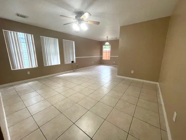 a view of an empty room and window