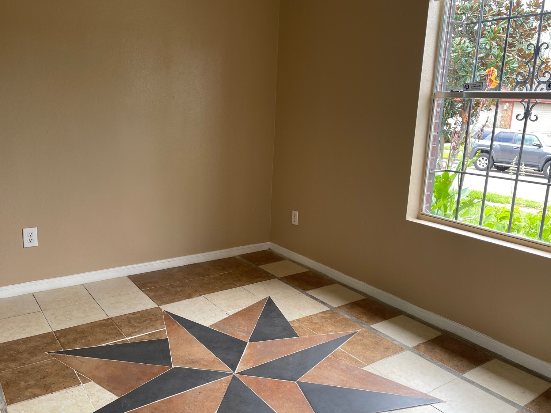 1134 Somercotes Lane Channelview, TX 77530 - Photo 9 of 13 a view of an empty room with a window