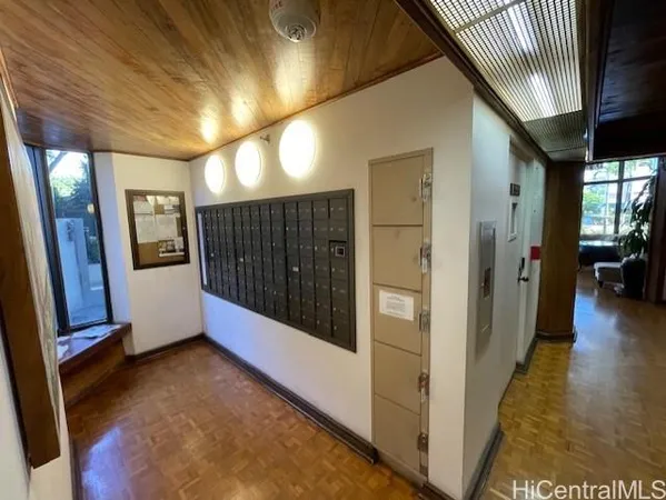 a view of a hallway view with staircase