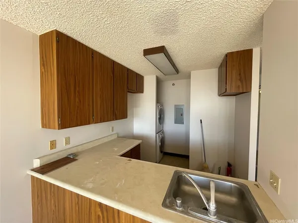 a bathroom with a sink and a shower