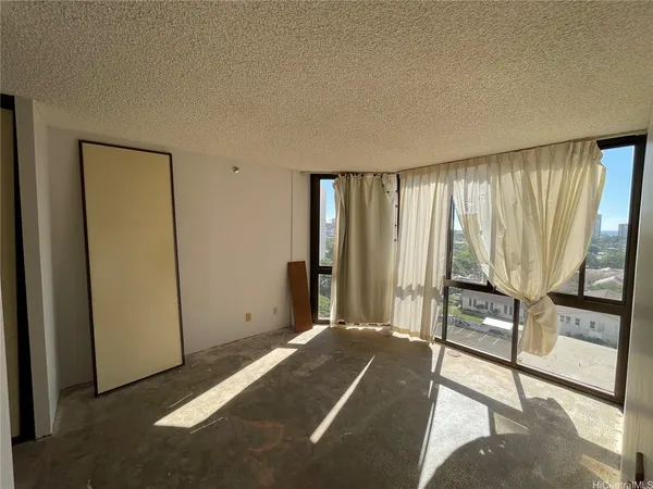 a view of a room with windows