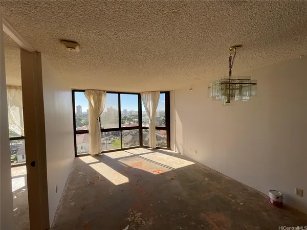 a view of a bedroom with a balcony