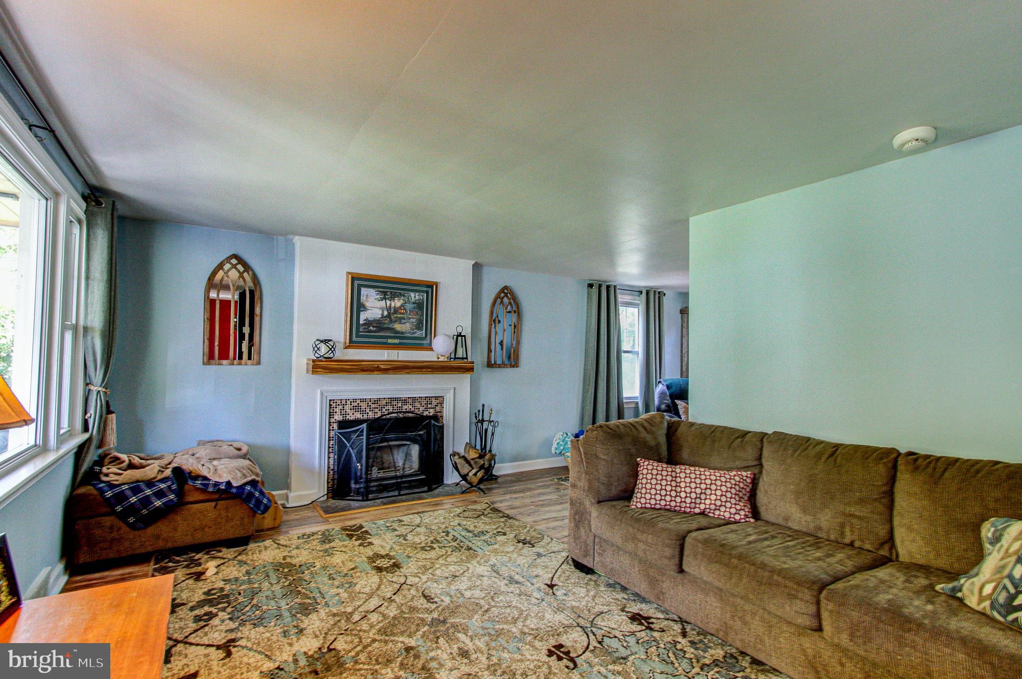 220 Byberry Road Hatboro, PA 19040 - Photo 7 of 28 Living Room with wood burning fireplace