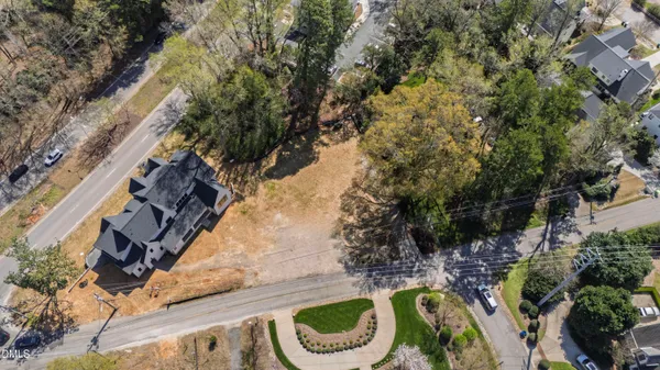 an aerial view of a house with outdoor space