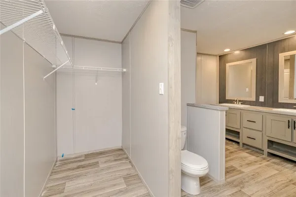 a bathroom with a sink and a toilet