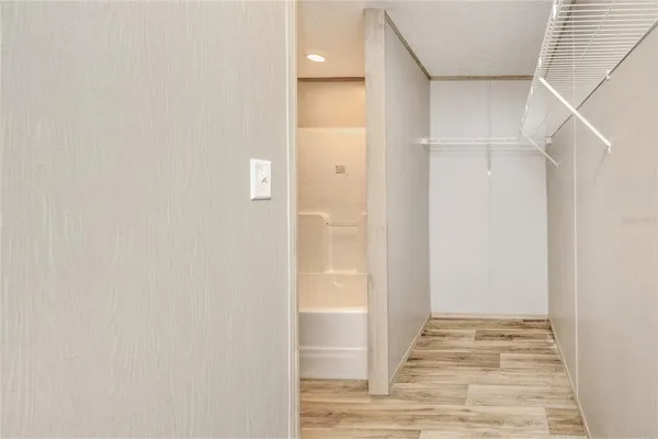 a view of an empty walk in closet