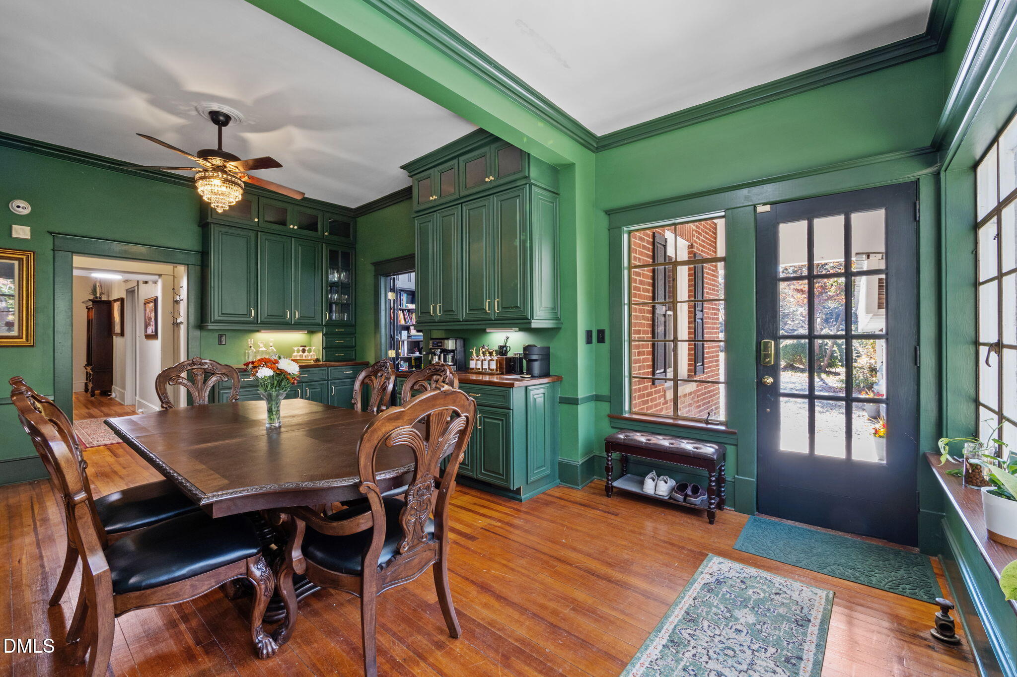 7891 Boston Road Roxboro, NC 27574 - Photo 29 of 85 a dining room with furniture a rug and a large window