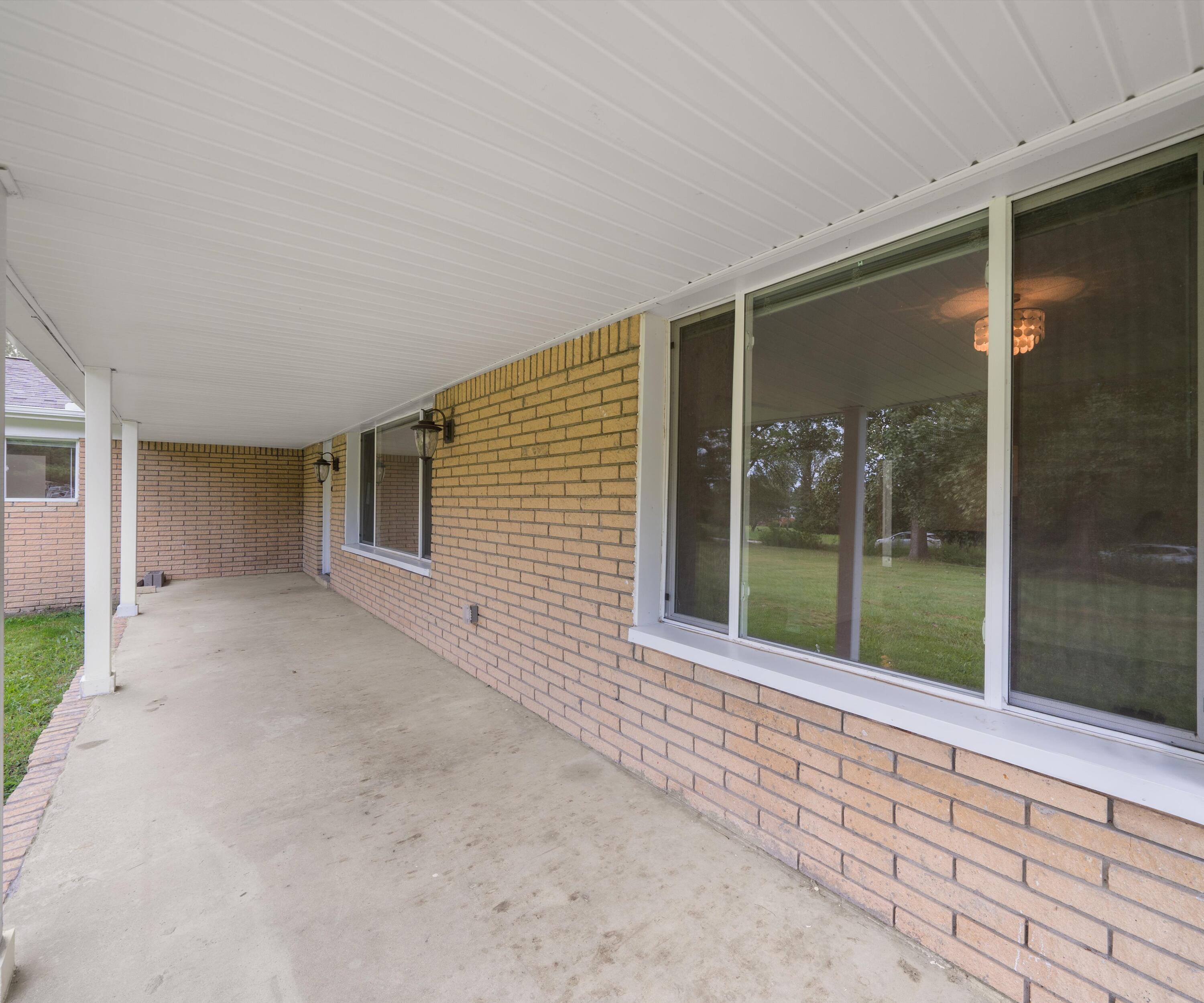 26700 Martinsville Road Belleville, MI 48111 - Photo 8 of 41 front porch